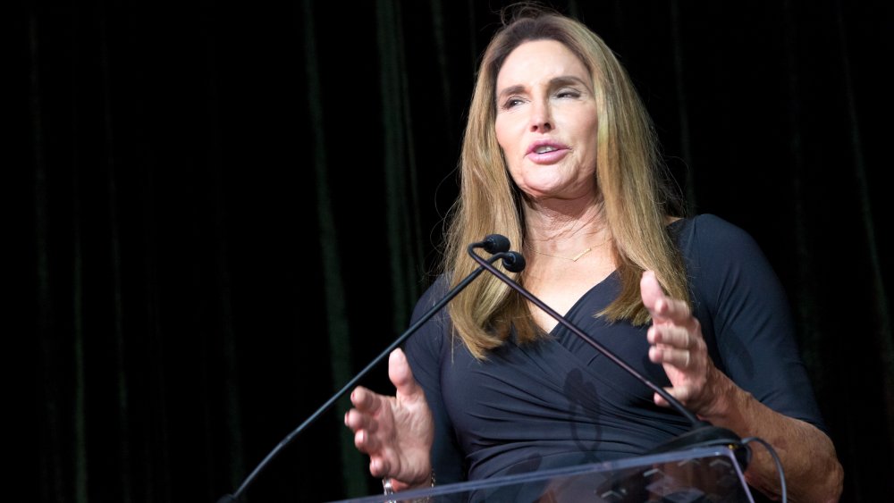 Caitlyn Jenner speaking into a microphone