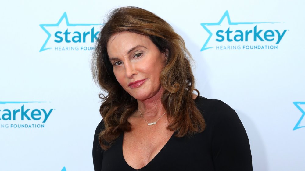 Caitlyn Jenner at a Starkey event in a black dress