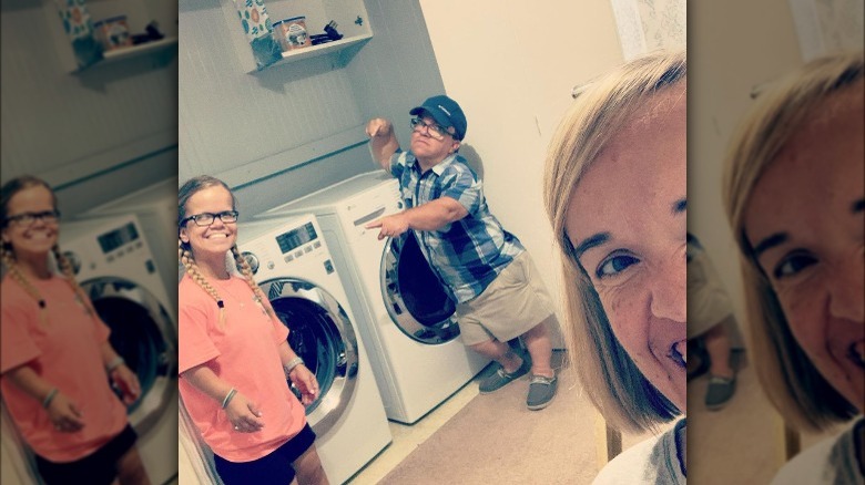 Trent, Amber and Anna Marie Johnston pose