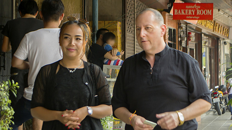 David Toborowsky and Annie Suwan walking in Thailand
