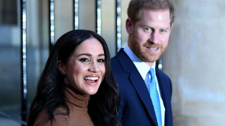 The Sussexes smile for cameras