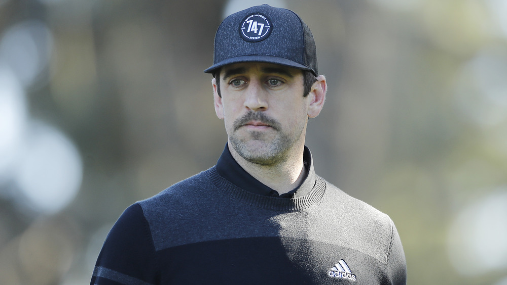 Aaron Rodgers at golf tournament