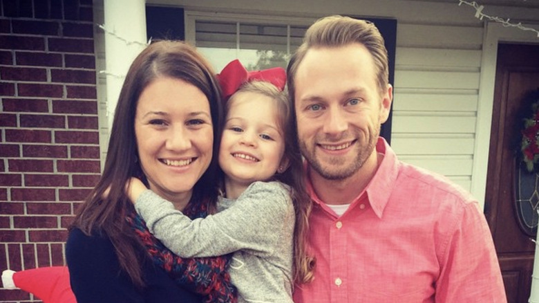 OutDaughtered stars Adam and Danielle Busby and their daughter