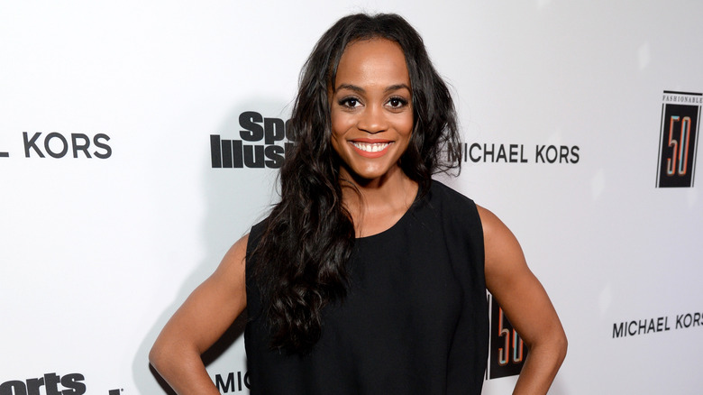 Rachel Lindsay smiling, hands on hips