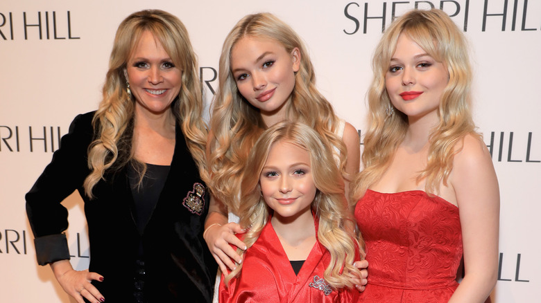 Barbara Alyn Woods and her daughters