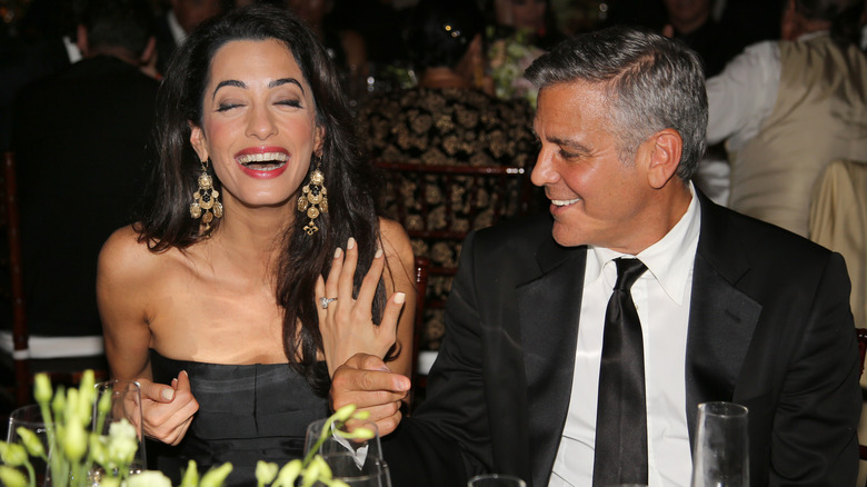 Amal and George Clooney laughing