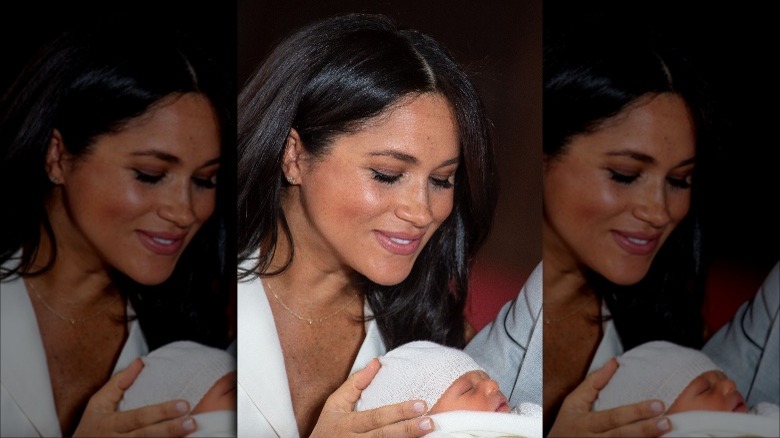 Meghan smiling at baby Archie