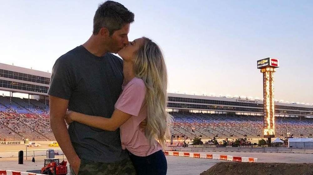 Arie, Lauren kissing at racetrack