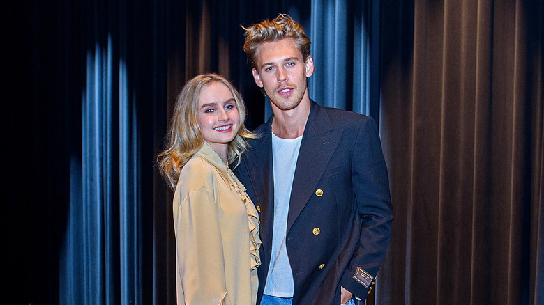 Austin Butler and Olivia DeJonge posing 