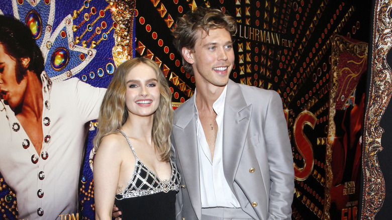 Austin Butler and Olivia DeJonge posing 