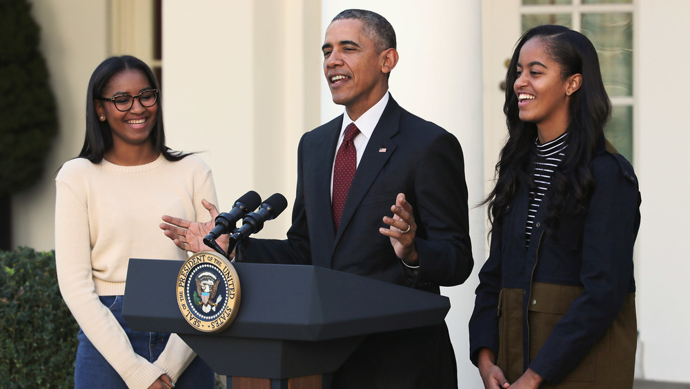 Barack, Sasha, and Malia Obama