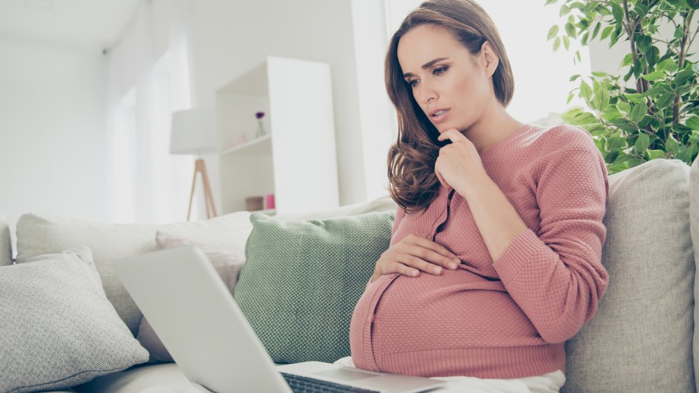 pregnant woman working from home during pandemic