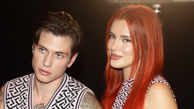 Benjamin Mascolo and Bella Thorne pose at an event together