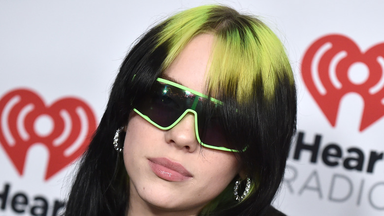 Billie Eilish poses on the red carpet