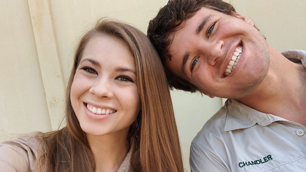 Bindi Irwin and Chandler Powell smiling in a selfie