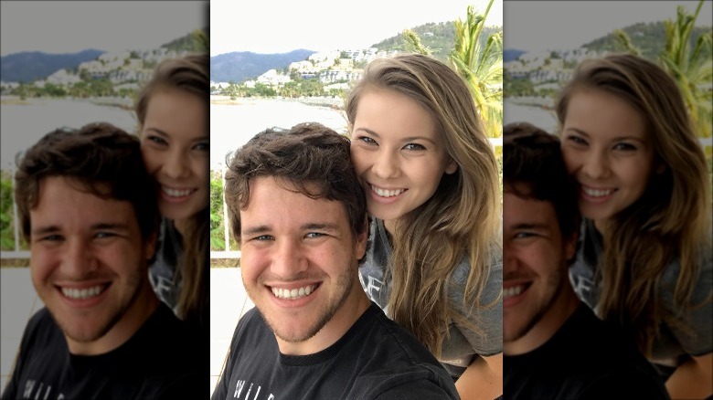 Chandler Powell and Bindi Irwin smiling together