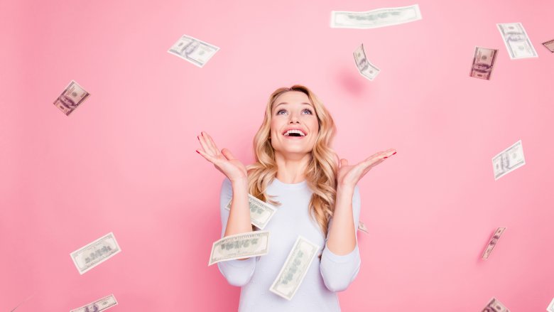 Blonde woman with money