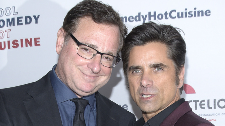 Bob Saget and John Stamos posing