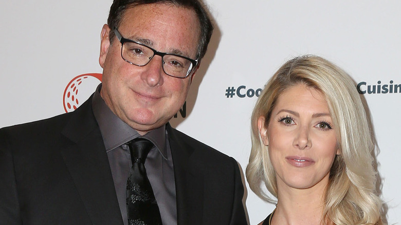 Bob Saget and Kelly Rizzo photographed at an event