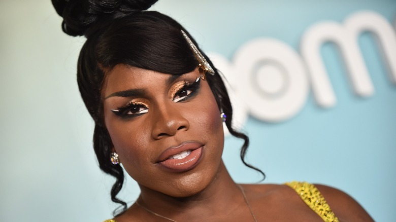 Monét X Change poses on the red carpet