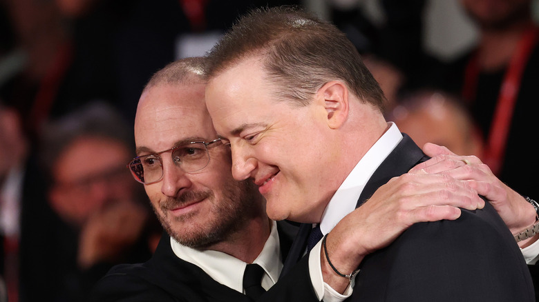 Brendan Fraser and Darren Aronofsky smiling