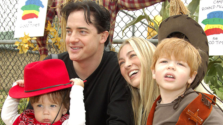 Brendan Fraser and Afton Smith enjoy an event with two of their sons