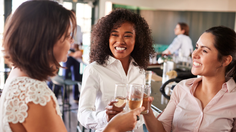 Women drinking at a bar