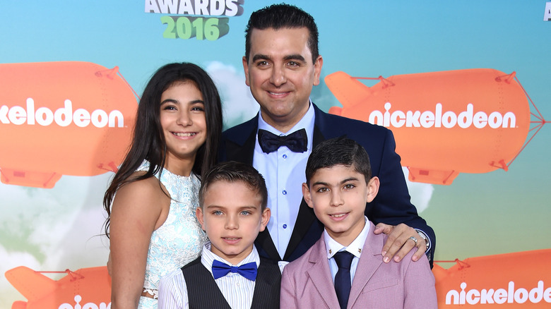 Buddy Valastro posing with his kids