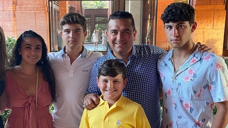 Buddy Valastro posing with his kids