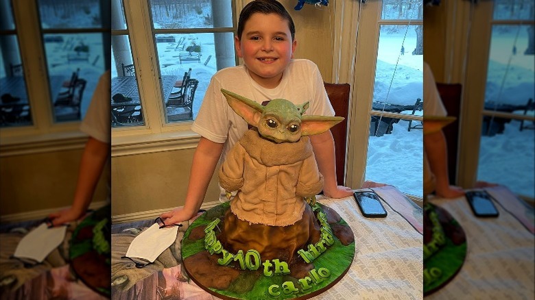 Carlo Valastro posing with a birthday cake