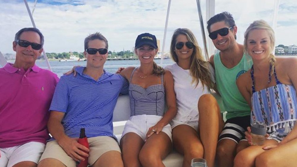 Cameran Eubanks and Jason Wimberly in a boat with some of the Southern Charm cast