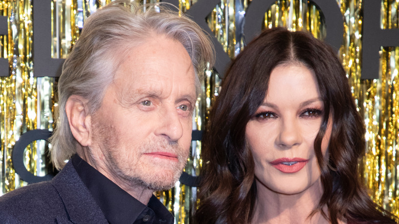 Catherine Zeta-Jones and Michael Douglas posing