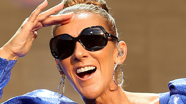 Celine Dion smiling with sunglasses