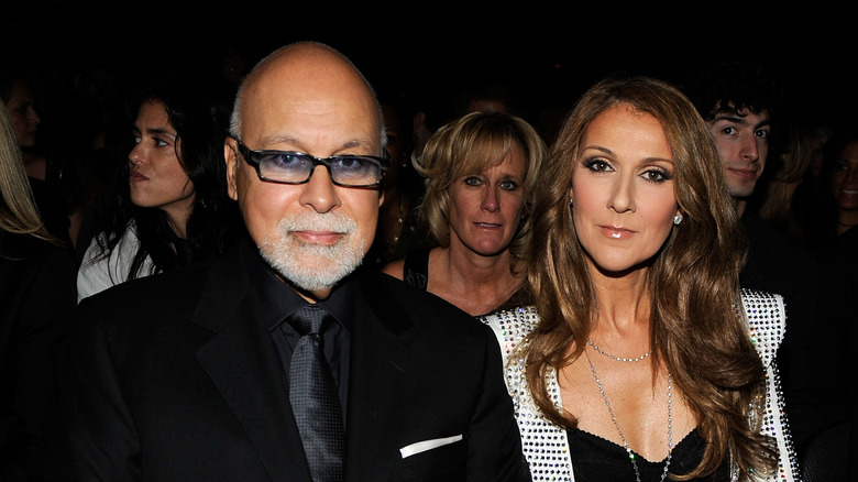 Celine Dion and Rene Angelil posing  