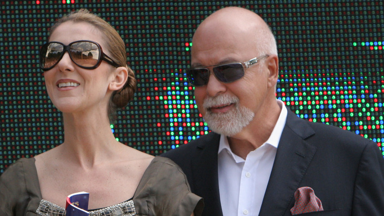 Celine Dion and Rene Angelil posing  