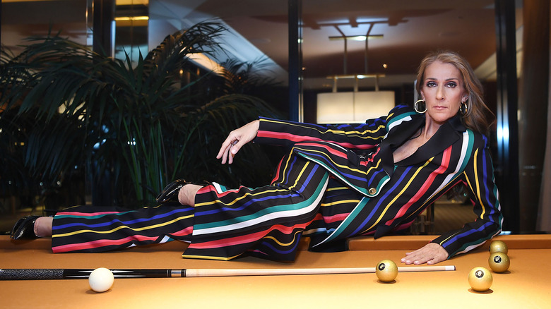 Celine Dion wearing rainbow suit