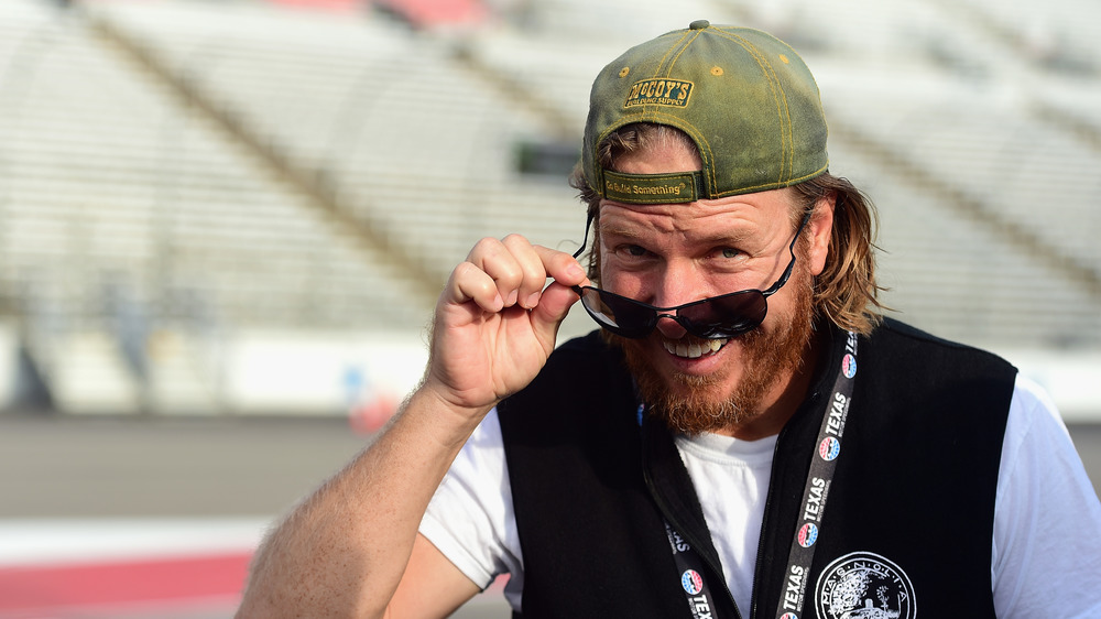 Chip Gaines wearing sunglasses, smiling