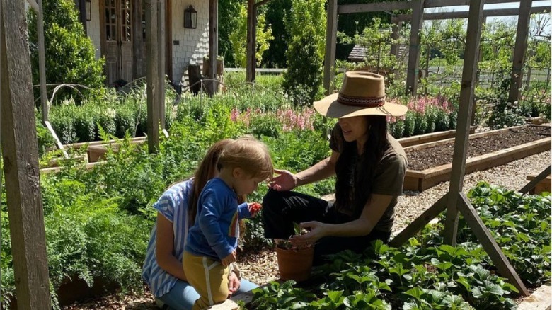 Joanna gardening with her kids