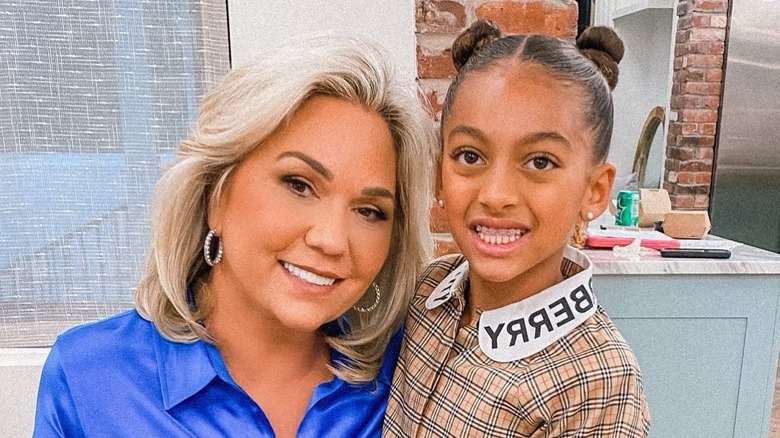 Julie Chrisley poses for a photo with granddaughter Chloe