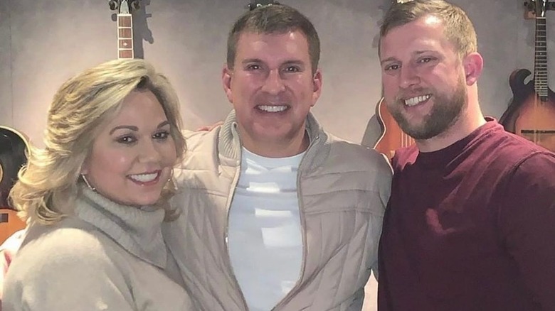 Kyle Chrisley poses with his parents