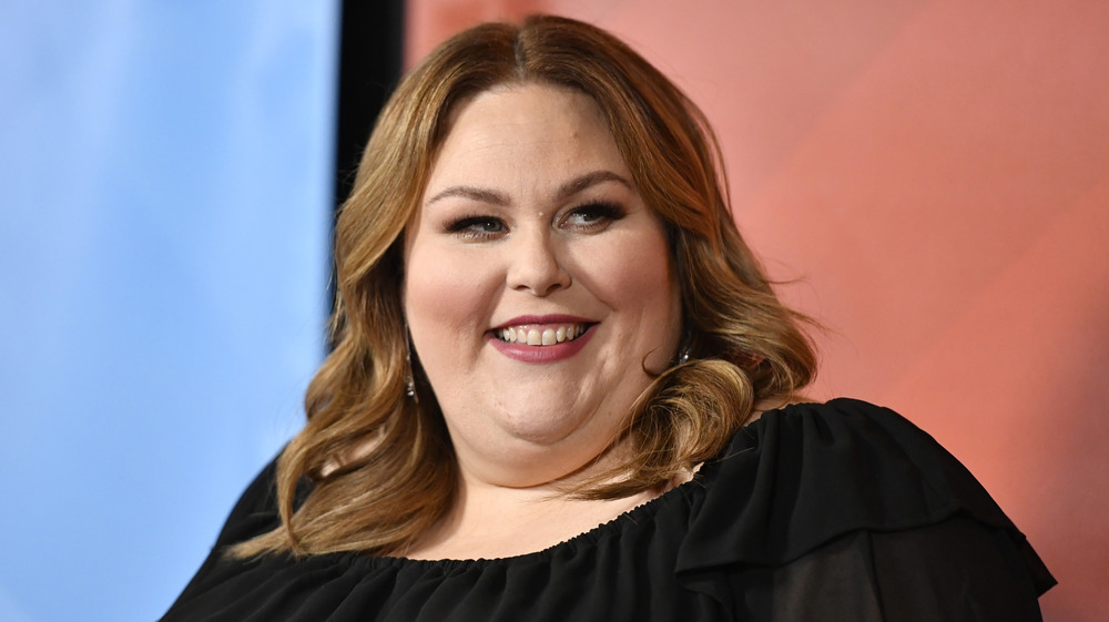 Actor Chrissy Metz smiling in black top