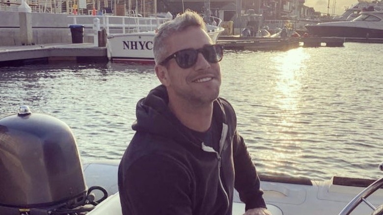 Ant Anstead smiling on a boat