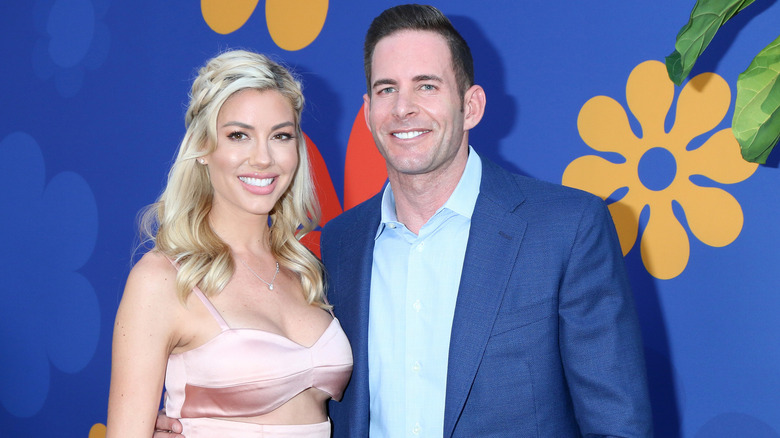 Tarek El Moussa Heather Rae Young posing 