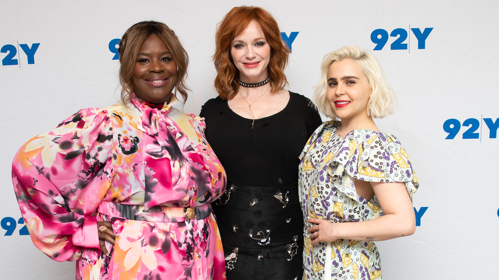 Christina Hendricks, Retta, Mae Whitman posing on red carpet