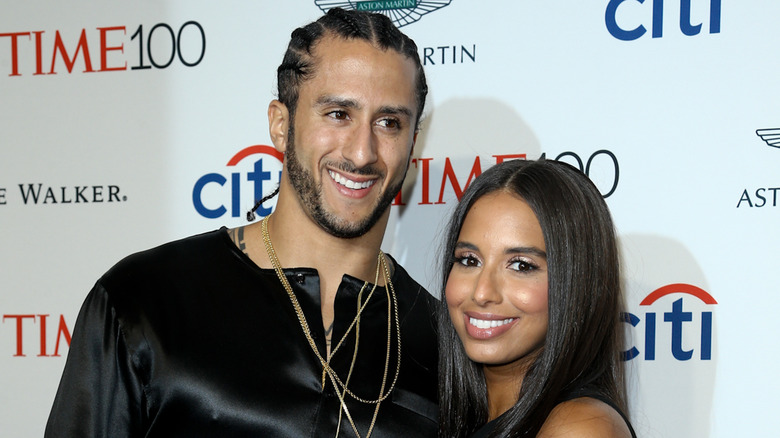 Colin Kaepernick and Nessa Diab smiling 