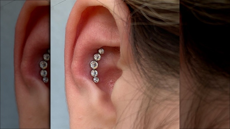 five-piece conch piercing