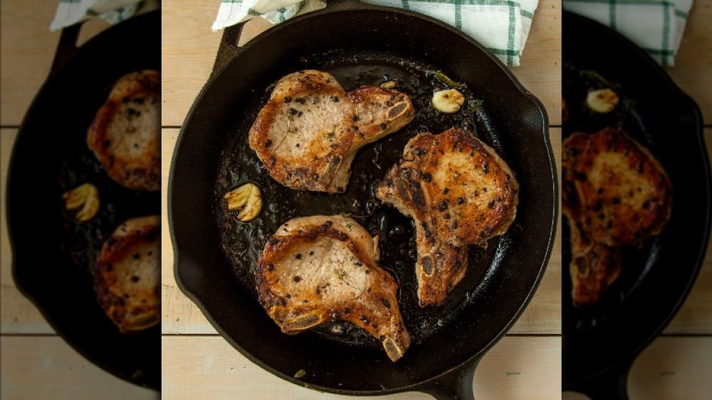 Pork chops in skillet