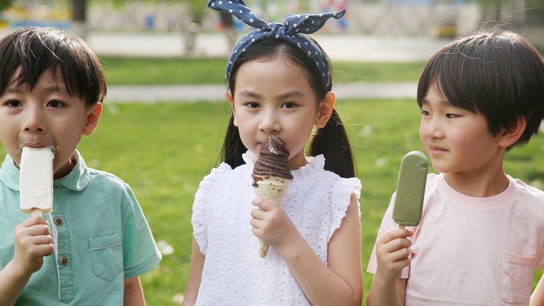 Children eating frozen treats