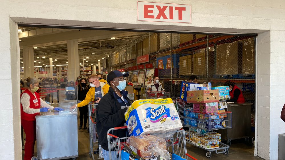 Customers with face masks exiting Costco