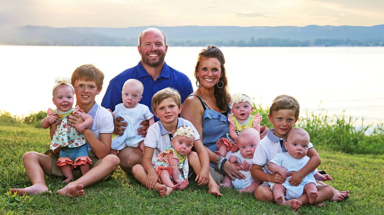 Courtney and Eric Waldrop with all their children smiling 